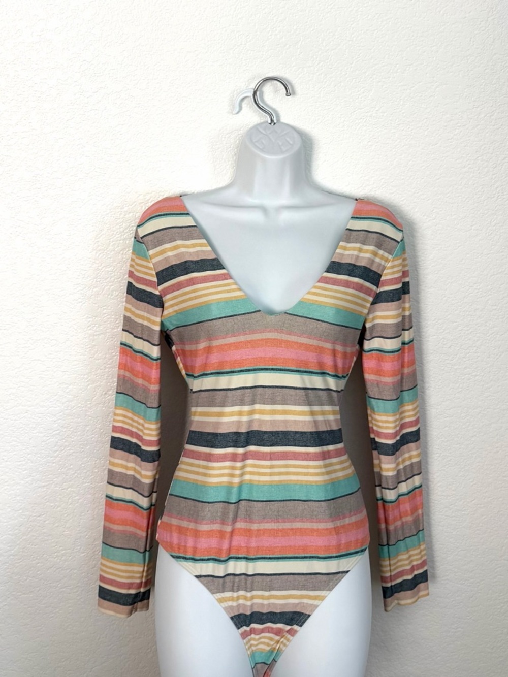 O'Neill Striped V-Neck One-Piece in Pink, Mint, Tan, Cream, Gray.